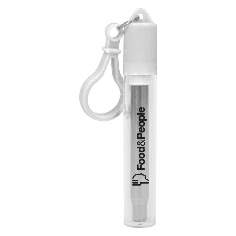 A clear tube containing a retractable stainless steel straw, with a white cap and a clip for easy attachment.