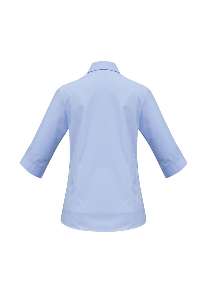 A light blue women's 3/4 sleeve shirt with a button-up design and a small logo on the back.
