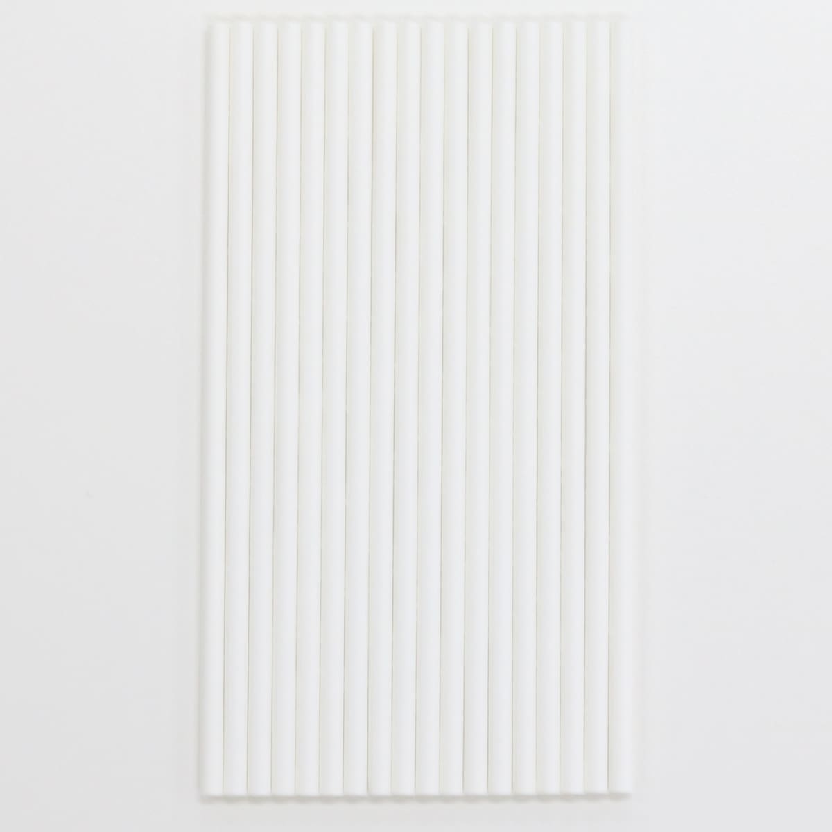 A collection of white straws arranged neatly on a light background, with a simple logo in the corner.