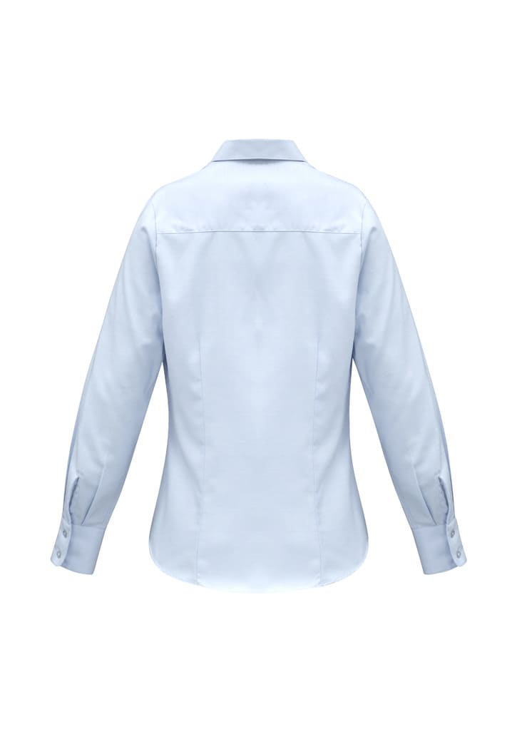 A light blue women's long sleeve button-up shirt with a collar and buttoned cuffs, featuring a branding logo.
