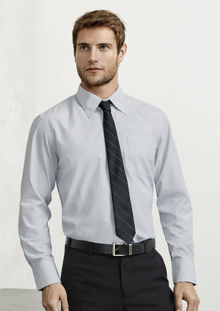 A light grey long sleeve button-up shirt with a pocket, worn with a black tie and trousers. It features a logo.