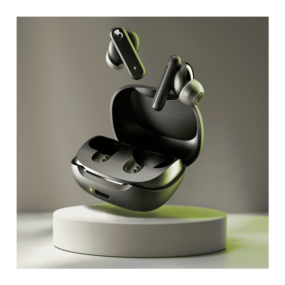 A pair of black earbuds and their charging case on a display stand, with a subtle grey background.