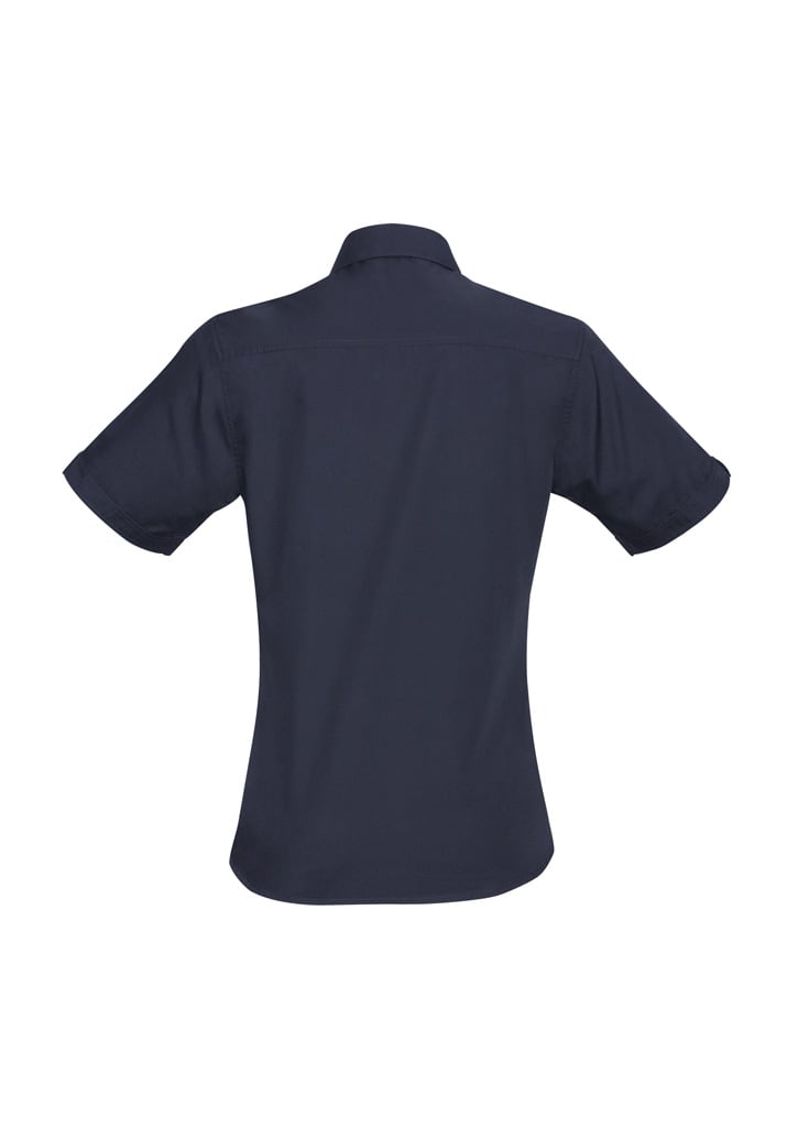 A women's short sleeve shirt in navy, featuring a standard collar and rolled sleeves. Includes a logo.