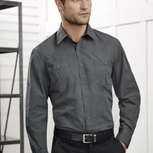 A grey long sleeve button-up shirt with two chest pockets, styled with a black belt and displayed on a model.