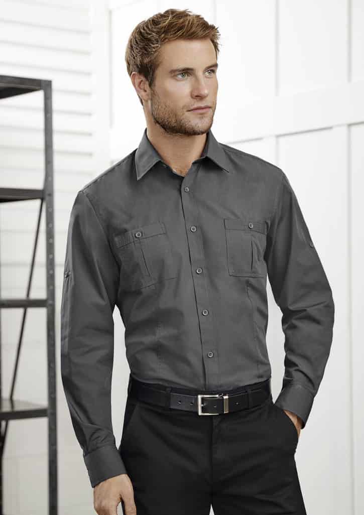 A grey long sleeve button-up shirt with two chest pockets, styled with a black belt and displayed on a model.