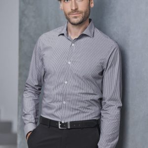 A tailored long sleeve shirt in grey and white stripes, featuring a button-up design, worn by a man against a grey backdrop.