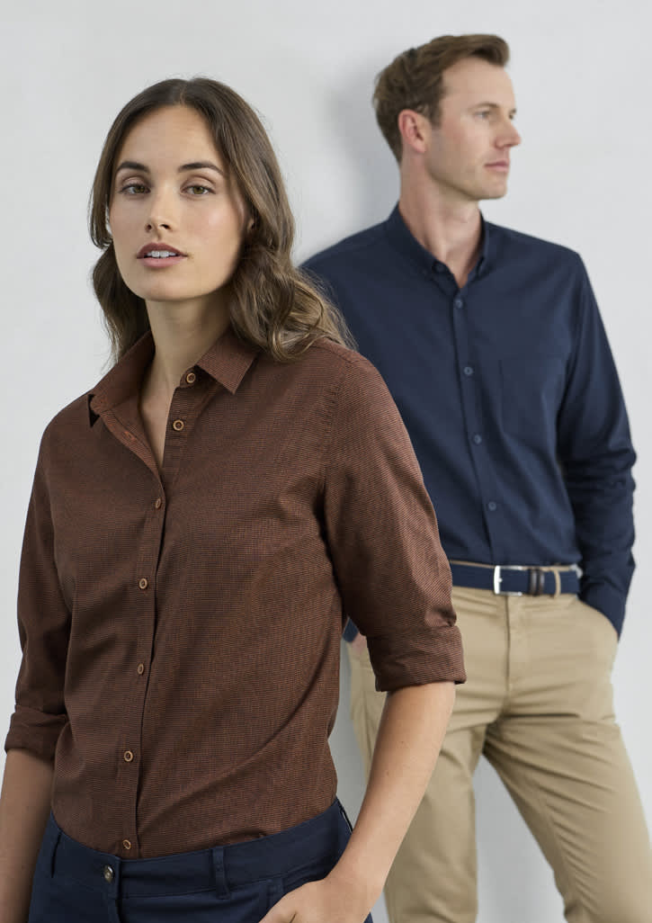 A brown long sleeve button-up shirt for men, featuring a collar and a pocket, displayed alongside a navy shirt.