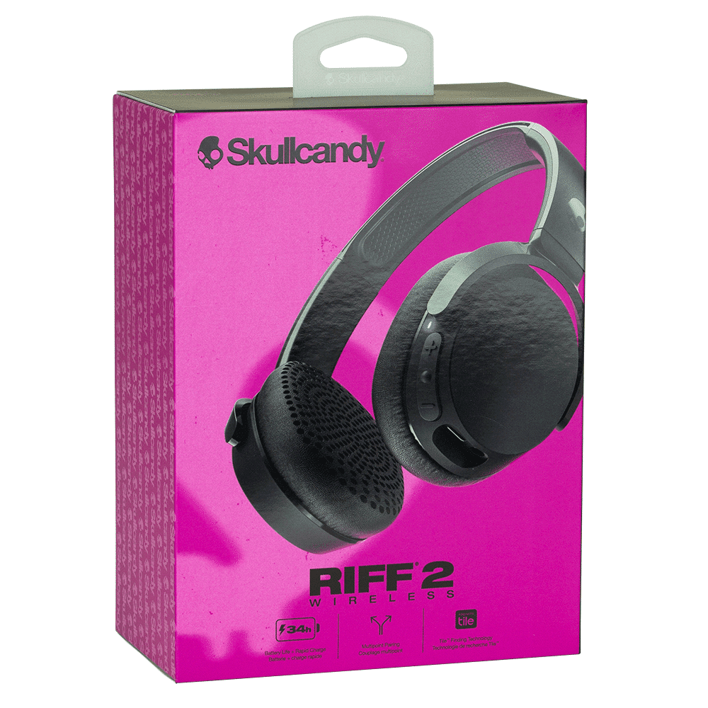 A pink box containing Skullcandy Riff Wireless headphones in black, featuring a handle and a logo.