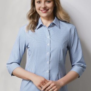 A women's button-up shirt in blue and white check pattern with 3/4 sleeves, featuring a collar and buttons.