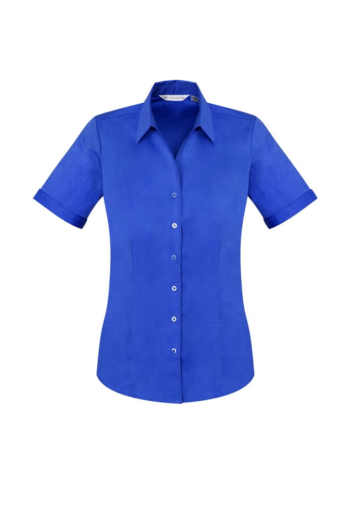 A blue short sleeve button-up shirt with a collar and branding on the design.