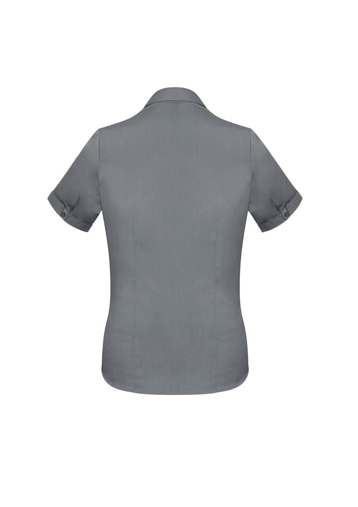 A grey short sleeve button-up shirt with rolled sleeves and a logo on the back.