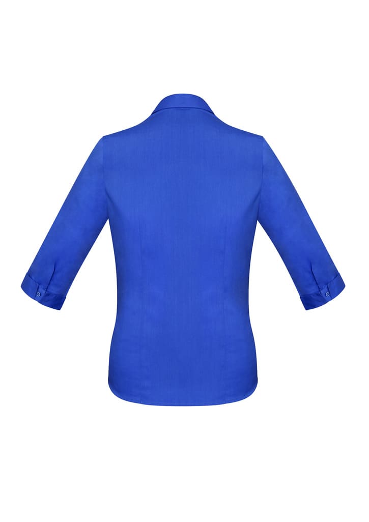 A blue 3/4 sleeve button-up shirt with a collar and roll-up cuffs, featuring a logo on the back.