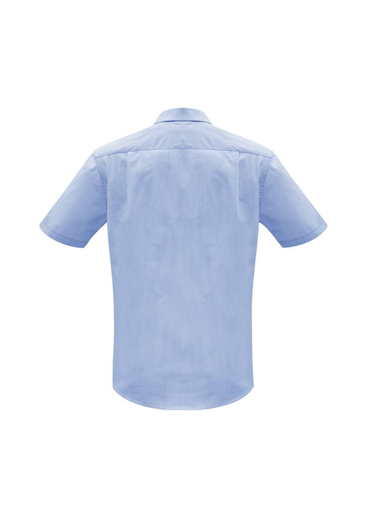A light blue short sleeve button-up shirt with a back yoke and collar. Features a logo on the upper back.