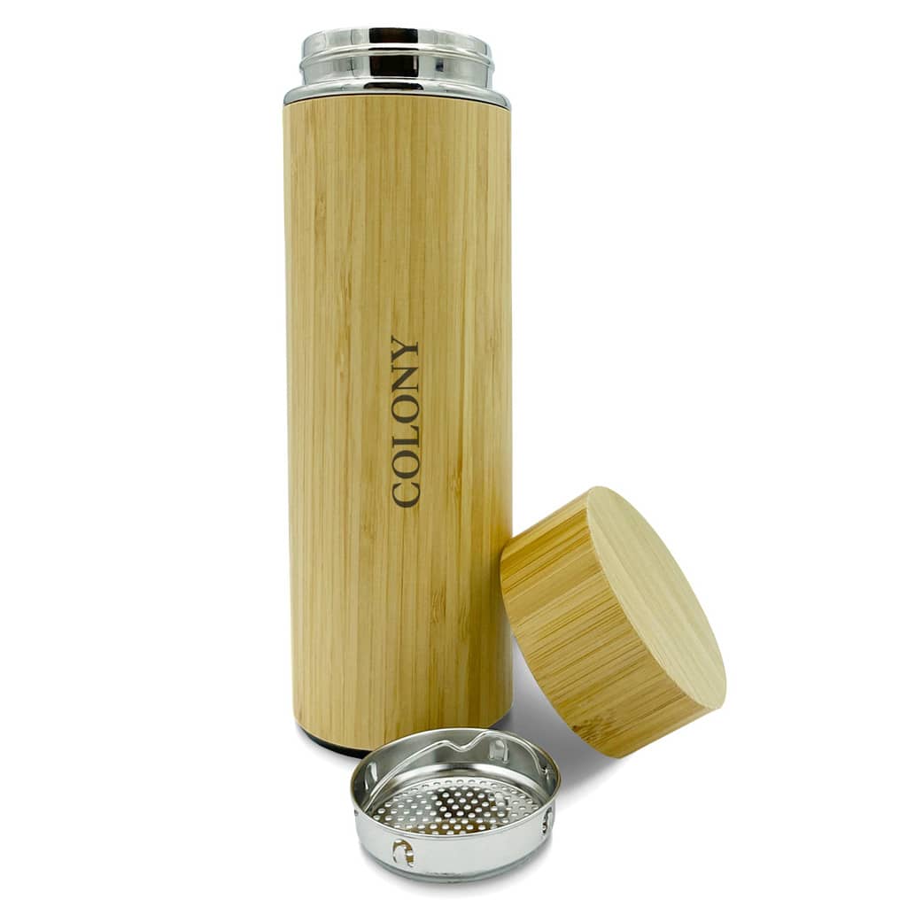A drink bottle with a bamboo exterior, metal lid, and a removable strainer. Features a logo on the body.