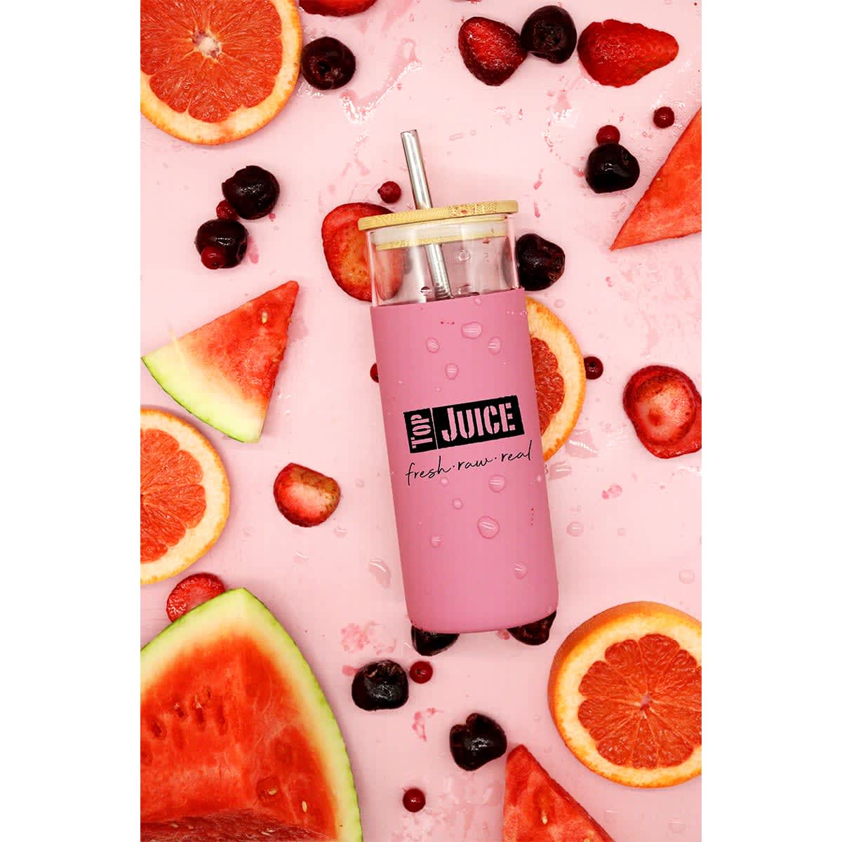 A drink bottle featuring a pink design, with a bamboo lid and straw, surrounded by sliced fruit and berries.