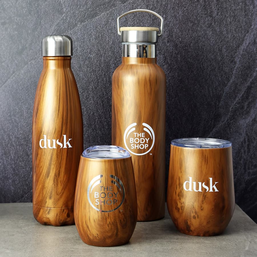 A drink bottle collection featuring wooden finish designs in various shapes and sizes, with logos displayed on some items.