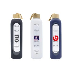 A drink bottle collection featuring navy, white, and black glass options with wooden lids and branding.