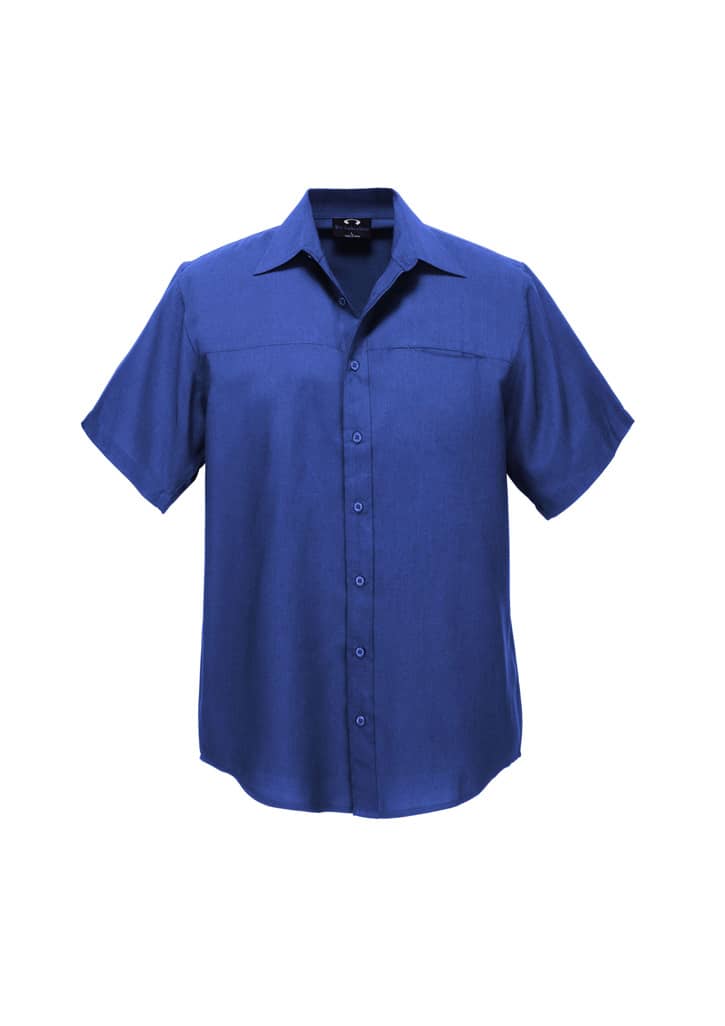 A short-sleeved button-up shirt in a deep blue hue with a single chest pocket and a logo.