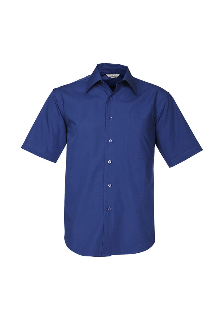 A blue short sleeve button-up shirt with a pocket and a logo on the chest.