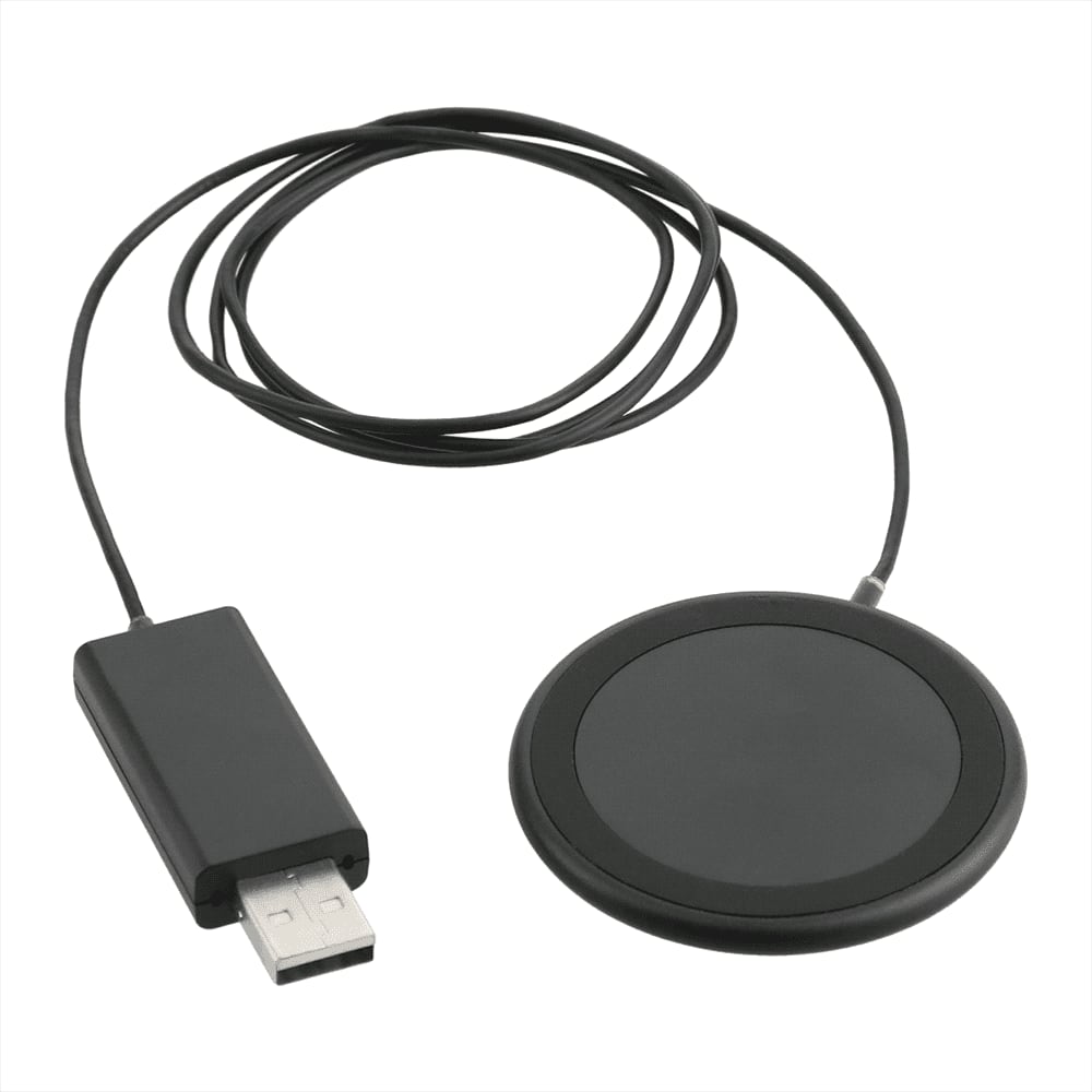 A black wireless charging pad with a USB connector and a cord. The pad has a smooth circular surface.