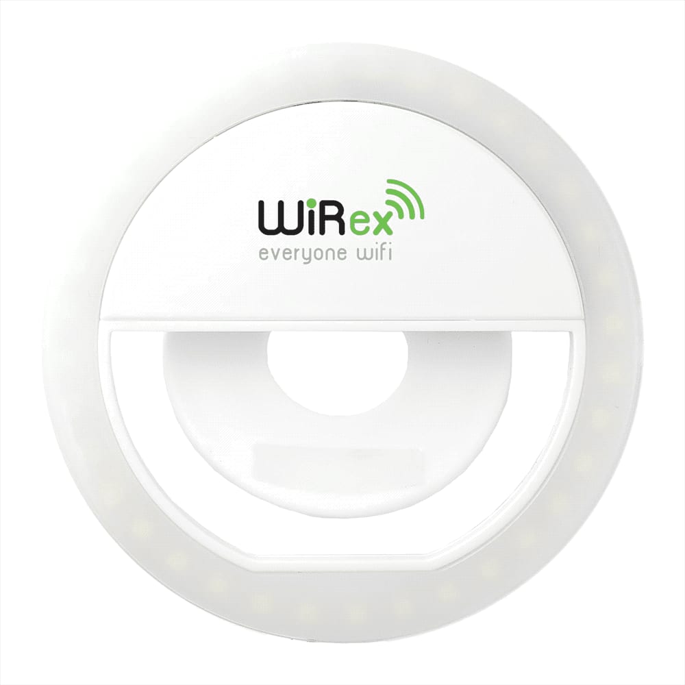A circular white LED light with a central cutout and a logo at the top, featuring multiple small light sources around its edge.