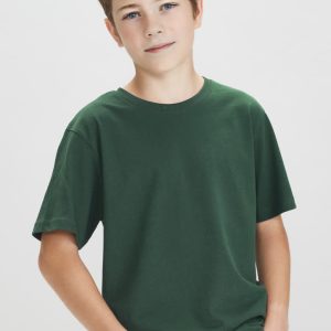 A green short sleeve tee for kids, displayed on a young boy with a neutral expression. The tee has a logo.