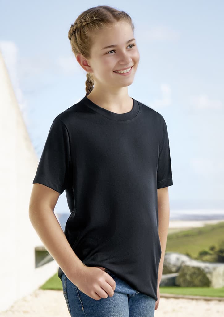 A black short sleeve tee for kids, displayed on a girl in a scenic outdoor setting.