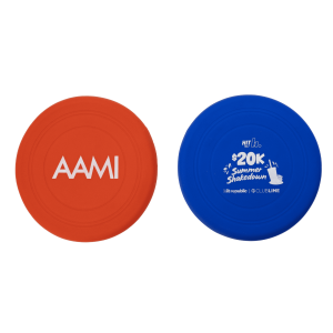 A silicon frisbee in red and blue, featuring a logo on one side and text on the other side.