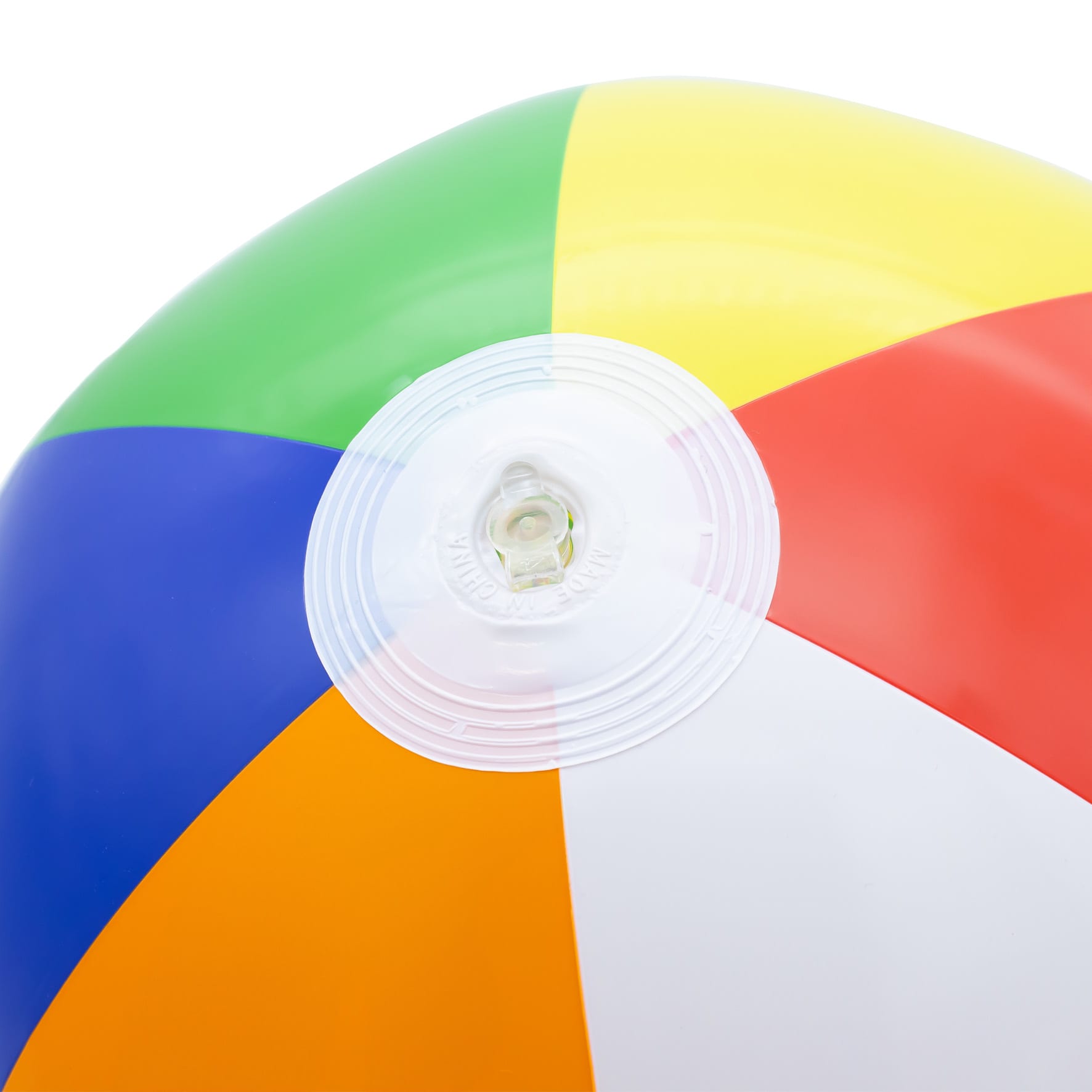 A colourful beach ball with red, yellow, green, blue, and orange segments, featuring a valve for inflation.