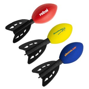 Three football-shaped stress toys in red, yellow, and blue, each with black fins and a logo.