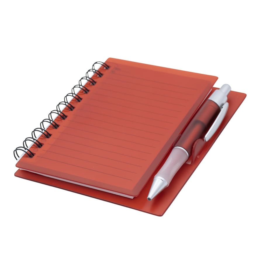 A red notepad with a spiral binding and a matching pen, laid flat against a white background.