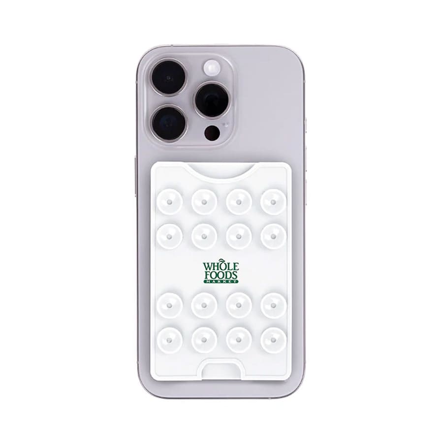 A white suction phone wallet with multiple suction cups on its surface, attached to a smartphone.