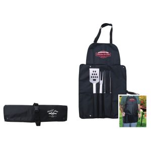 A black BBQ set featuring a spatula, fork, and tongs, neatly rolled into an apron-style holder. Includes a logo.