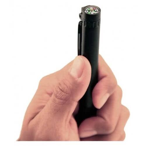 A black stylus pen held in a hand with a built-in compass at the top.