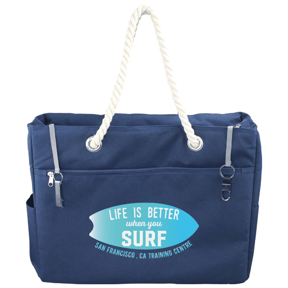 A navy waterproof beach bag with cream rope handles and side pockets, featuring a simple design.
