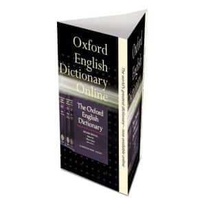 A triangular table tent display with a black and cream design featuring a logo and text related to an online dictionary.