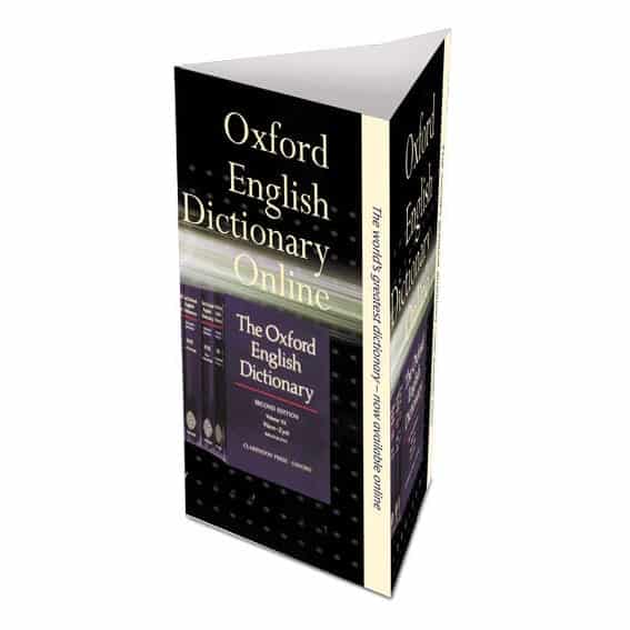 A triangular table tent display with a black and cream design featuring a logo and text related to an online dictionary.