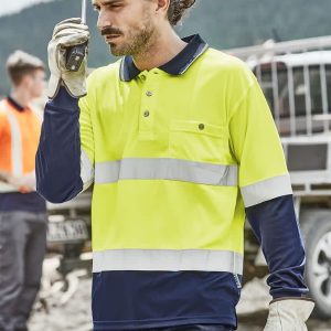 A men's high visibility long sleeve polo in bright yellow and navy, featuring reflective hoop tape and a pocket.