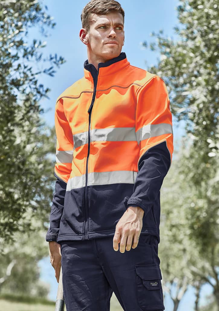 A unisex hi-vis softshell jacket in bright orange and navy, featuring reflective stripes and a logo on the chest.