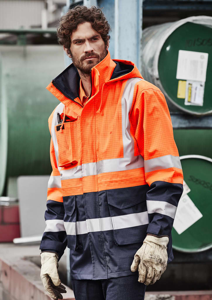 An orange and navy waterproof jacket with reflective stripes, featuring a hood and pockets, worn by a model.