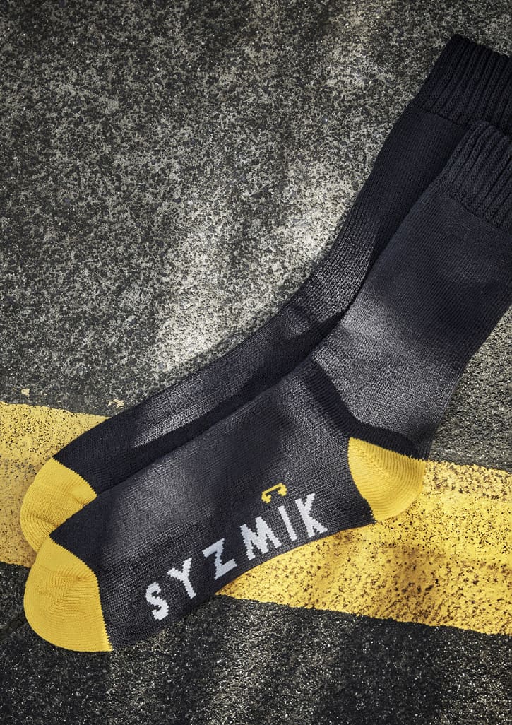 Bamboo work socks in black with yellow accents, featuring a logo and a comfortable fit. Three pairs included.