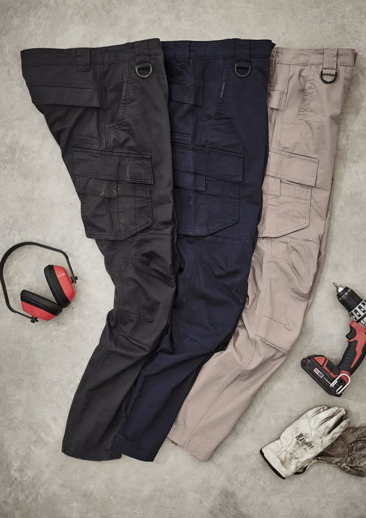 Three pairs of Men's Streetworx Curved Cargo Pants in black, navy, and beige, displayed with work tools and accessories.