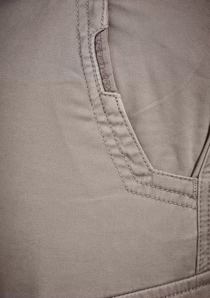 Close-up of a pair of men's cargo pants in a light beige colour, featuring a side pocket. The pants have a textured fabric.