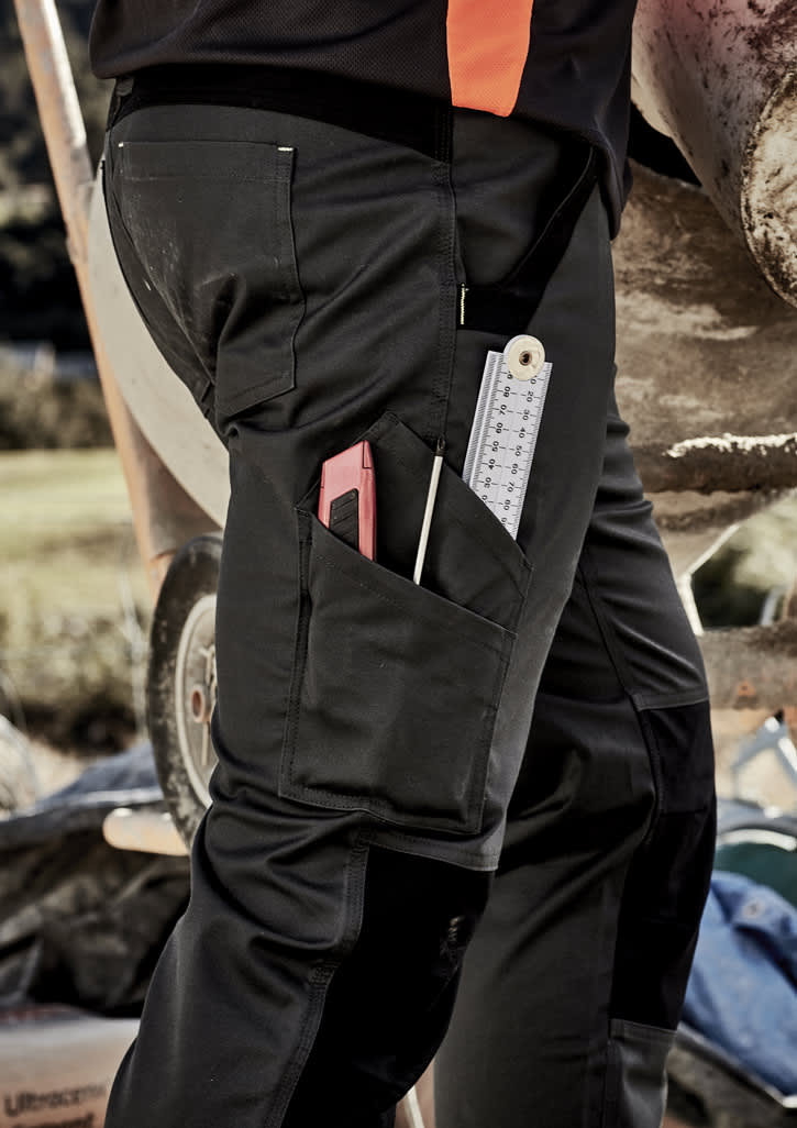 Men's work pants in black, featuring multiple pockets for tools and a visible logo, set outdoors.