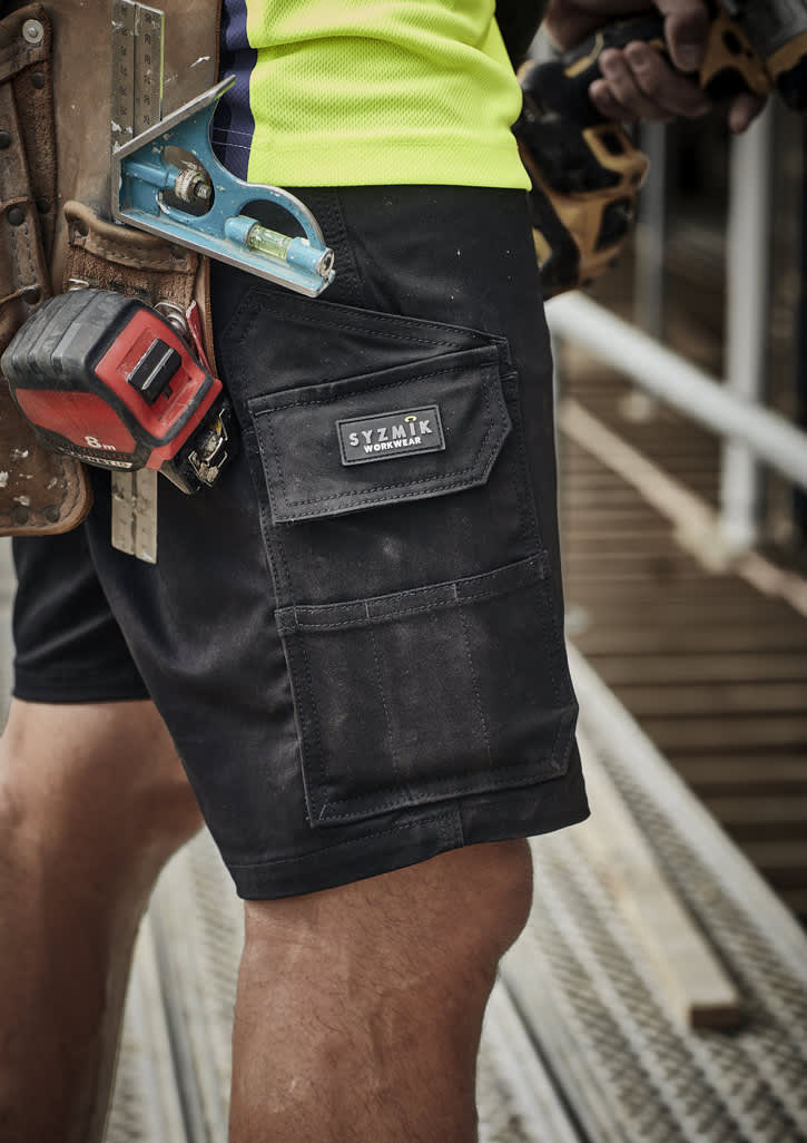 Black men's cargo shorts with multiple pockets, featuring a logo, ideal for work environments.