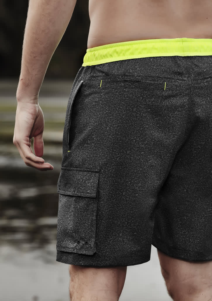Men's board shorts in black with neon yellow accents, featuring a cargo pocket and a drawstring waistband.