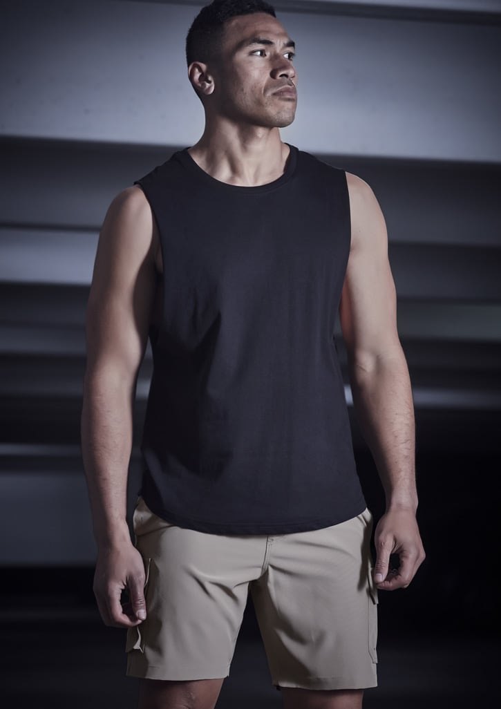 Men's Streetworx board shorts in khaki, paired with a black sleeveless top, featuring a logo.