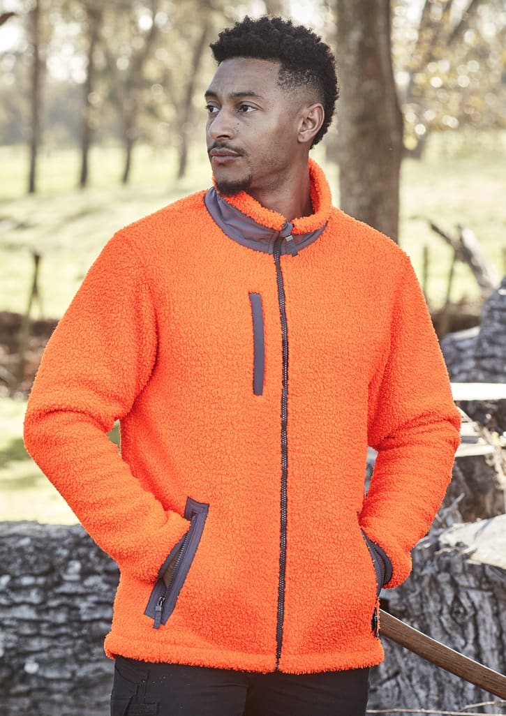 Unisex Streetworx Full Zip Sherpa Fleece in bright orange with dark accents and a zippered front, featuring pockets.