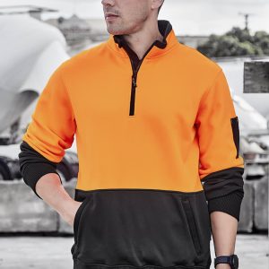 A unisex pullover in bright orange and black, featuring a half zip and a pocket, with a logo on the sleeve.