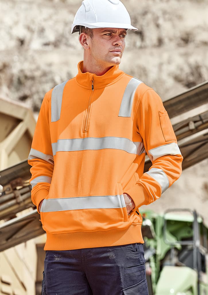 Unisex hi-vis pullover in bright orange, featuring reflective strips and a quarter zip. Includes a logo on the sleeve.